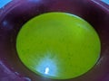 Green liquid mixture in a bowl Royalty Free Stock Photo