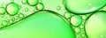 Green liquid oil bubble macro texture background