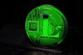 Green Litecoin LTC coin is surrounded by a gloomy background Royalty Free Stock Photo