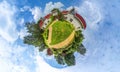 Green little planet panorama with architecture and trees, soft blue sky and white clouds. Buildings at summer. Summer.