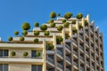 Green living, eco building with trees, climate change concept Royalty Free Stock Photo