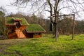 Green living roof on wooden building covered with vegetation Royalty Free Stock Photo