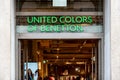 The green logo of United Colors of Benetton fashion store above the entrance Royalty Free Stock Photo