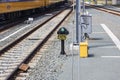 Green low sign light along the rails at Zwolle train station