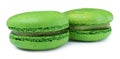 Green macarons on white background. Delicious dessert