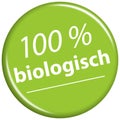 green magnet with text 100% biological (in german