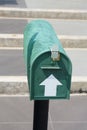 Green mail box in garden Royalty Free Stock Photo