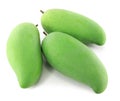 Green mangoes on a white background