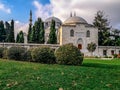 Green manicured lawn in the garden of the Suleymaniye Mosque in Istanbul Turkey in an autumn day. Beautiful public park with Royalty Free Stock Photo