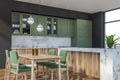 Green and marble kitchen corner, bar and table Royalty Free Stock Photo