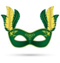 Green mask with feathers