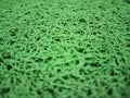 a green mat that looks like noodles Royalty Free Stock Photo