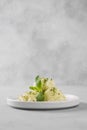 Green matcha ice cream and mint on grey table Royalty Free Stock Photo