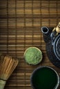 Green matcha tea ceremony. Bamboo background, top down view