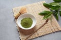 Green matcha tea drink and tea accessories on white background. Royalty Free Stock Photo