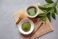 Green matcha tea drink and tea accessories on white background. Royalty Free Stock Photo
