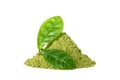 Green matcha tea powder with green wet leaves isolated on white Royalty Free Stock Photo