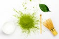 Green matcha tea powder and tea accessories on white background Royalty Free Stock Photo