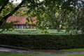 Green maze with a Germanic style house behind in Nova Petropolis