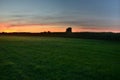 Meadow, corn field and sky after sunset Royalty Free Stock Photo