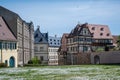 Green meadow in front of timber framing houses in Bamberg, Germany