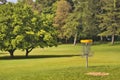 The green meadow on the Gurten hill in the city of Bern where there is a field from the national frisbee tournament