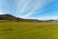 Green Meadow and old village houses in Bakuriani , Georgia Royalty Free Stock Photo