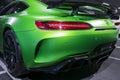 Green Mercedes-Benz AMG GTR 2018 V8 Bi-turbo exterior details. Back view. Car exterior details