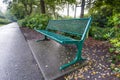 Green metal bench in a park Royalty Free Stock Photo