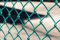 Green metal chain link fence background