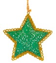 Green metal Christmas tree decoration in shape of five-pointed star with golden glittering borders Royalty Free Stock Photo