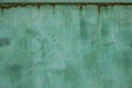 Green metal dirty sheet fence. Rust grunge leaks template blank. Old paint on the fence. Copper abstract wall art Royalty Free Stock Photo