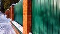 Green Metal fence with vertical picket fence and lines. Abstract background, frame, texture with place for text and copy Royalty Free Stock Photo