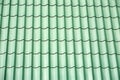 Green metal tile house roof as texture