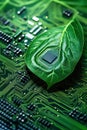 Green micro chip on circuit board and green leaves. Ecological concept. Royalty Free Stock Photo