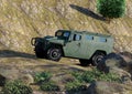 Green military armored vehicle off road going up mountain with rugged terrain