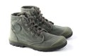 Green military style sneakers on white