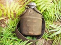 Green military water bottle for hiking, camping