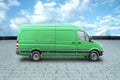 Green minibus on the background of the road. Delivery concept, online ordering, moving assistance. Delivery by car to anywhere