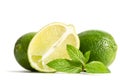 Green mint, two limes with half of a juicy lime Royalty Free Stock Photo