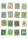 Green mint vintage postage stamps from the United Kingdom.