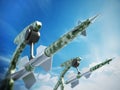 Green missiles aimed for the sky. 3D illustration