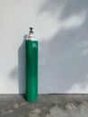 Green oxygen tank, medical equipment for hospital used,  treatment aid in respiratory disease and COVID-19 Royalty Free Stock Photo