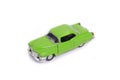 Green model toy car in retro style.