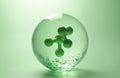 Green molecule structure suspended inside transparent sphere with liquid and bubbles. Abstract 3D rendering for cosmetic skincare Royalty Free Stock Photo