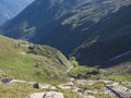 Green mountain valley with spring at Stubai hiking trail, Stubai Hohenweg, Summer rocky alpine landscape of Tyrol Royalty Free Stock Photo