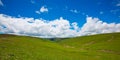 Green mountain, white cloud and blue sky