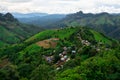 Green mountains and beautiful sky clouds under the blue sky  Natural landscape  Mountain village Royalty Free Stock Photo