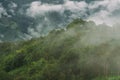 Green mountains and fluffy clouds