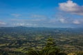 Green mountains and valleys of the island of Haiti. Blue mountai